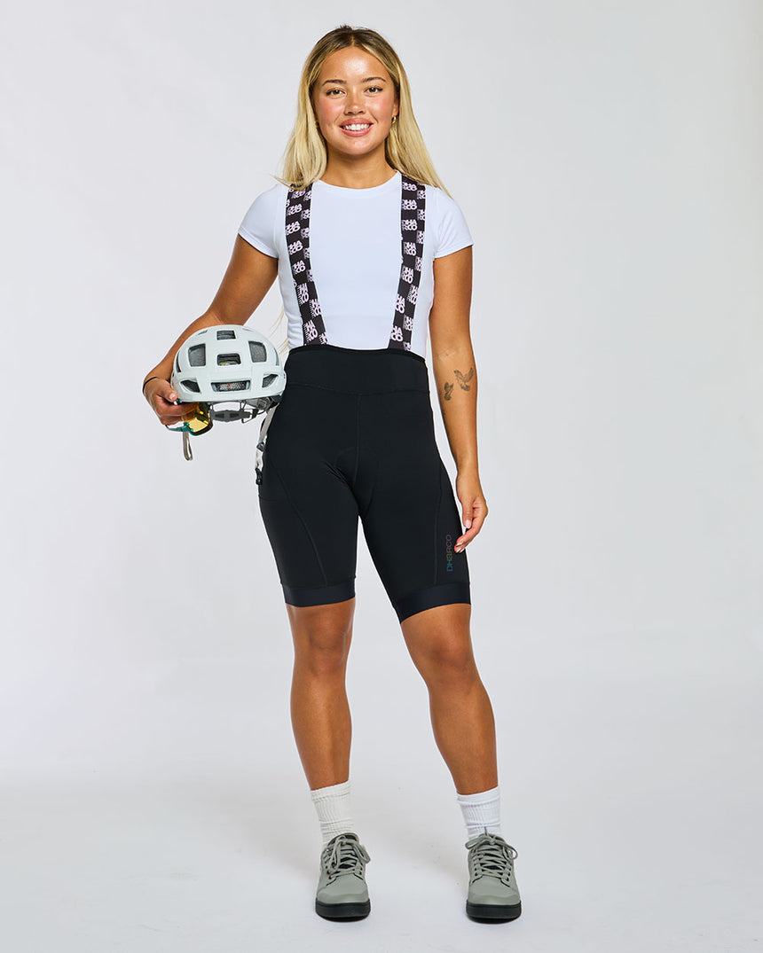QOM Bib | Black/Check Please | Bibs | WOMENS BOTTOMS | DHaRCO | Image 1 of 10